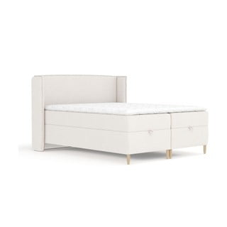 Krémová boxspring postel s úložným prostorem 180x200 cm Monpelli – Maison de Rêve