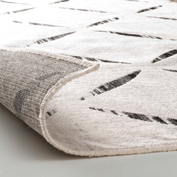 Béžový koberec s příměsí bavlny 68x110 cm Modesto – douceur d'intérieur-image-3