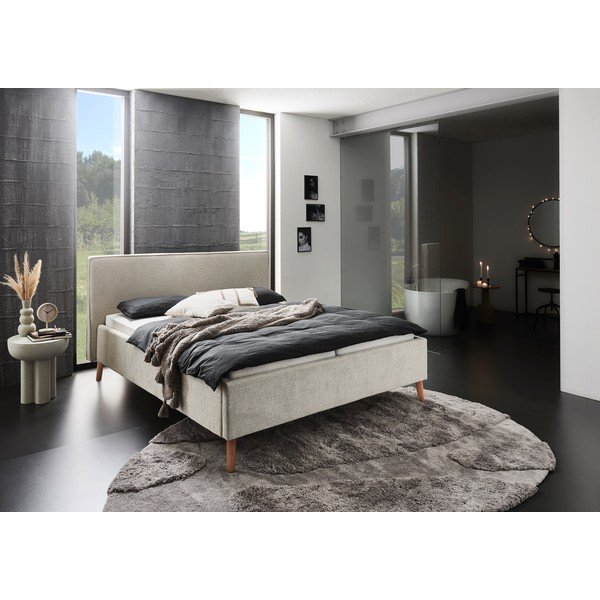 Krémová čalouněná dvoulůžková postel s úložným prostorem s roštem 160x200 cm Riva – Meise Möbel-image-1