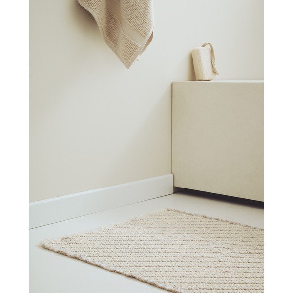 Béžová koupelnová předložka 50x70 cm Janu – Kave Home-image-1