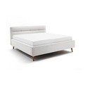 Světle šedá čalouněná dvoulůžková postel s úložným prostorem s roštem 180x200 cm Lotte – Meise Möbel