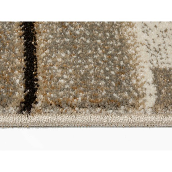 Béžový koberec Universal Bukit Beige, 70 x 135 cm-image-1