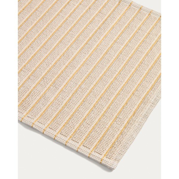 Žlutá/béžová textilní koupelnová předložka 50x80 cm Merade – Kave Home-image-1