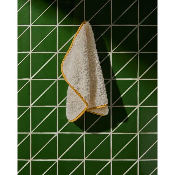 Žlutý/bílý froté bavlněný ručník 30x50 cm Sedora – Kave Home-image-1