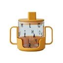 Hořčicově žlutý dětský hrnek Design Letters Grow With Your Cup