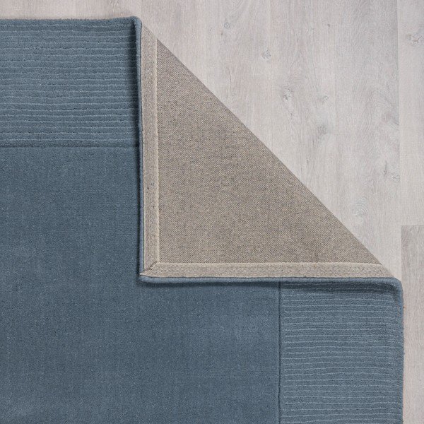 Tmavě modrý ručně tkaný vlněný koberec 120x170 cm Textured Wool Border – Flair Rugs-image-3