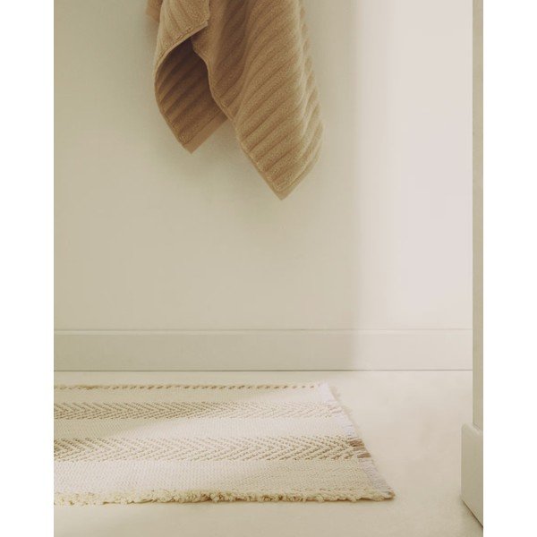 Béžová koupelnová předložka 50x70 cm Bina – Kave Home-image-1