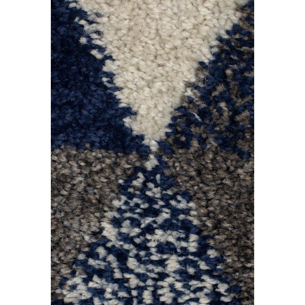 Tmavě modrý koberec Flair Rugs Nuru, 80 x 150 cm-image-1