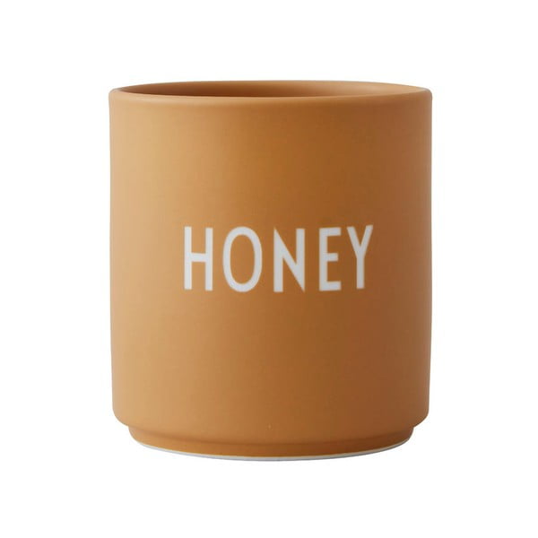 Hořčicově žlutý porcelánový hrnek Design Letters Favourite Honey