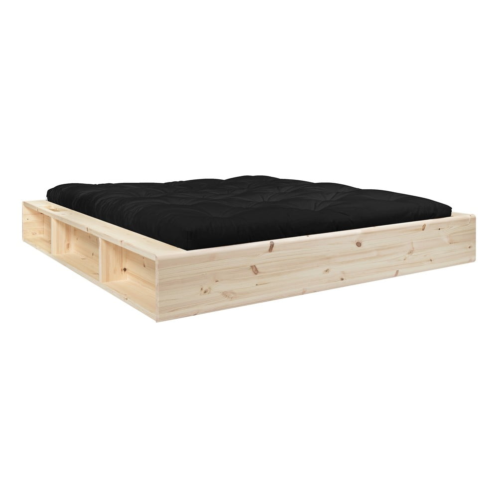 Dvoulůžková postel z masivního dřeva s úložným prostorem a černým futonem Comfort Karup Design Ziggy, 160 x 200 cm